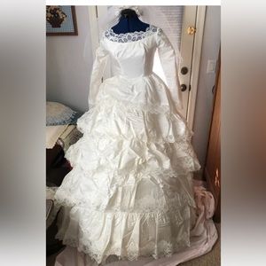 Vintage wedding dress and longer back train and veil